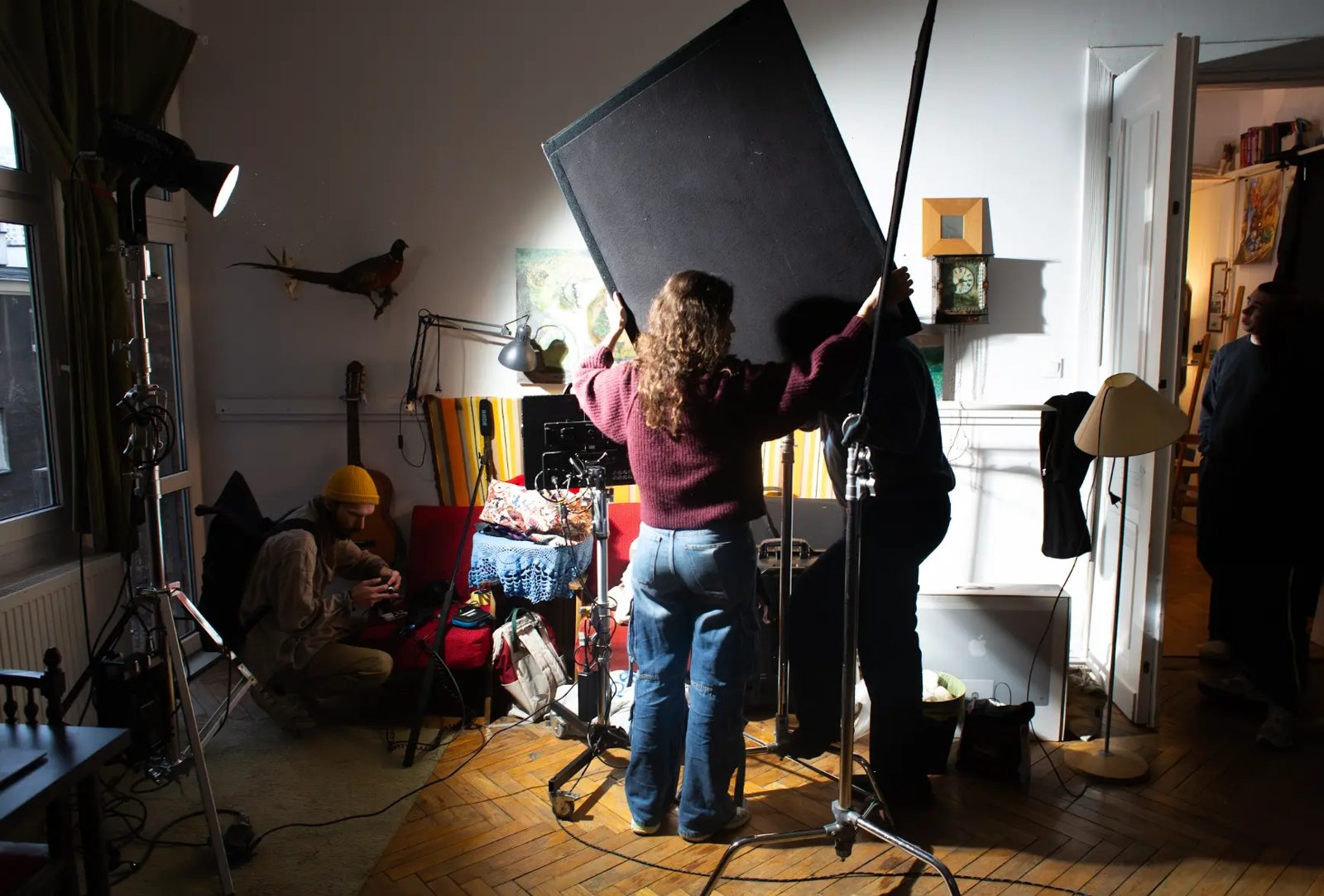 Film crew setting up lights on location during the 48-hour shoot